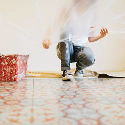 More files of this series and models on port. Young spanish couple painting their new home. made in Barcelona Spain.